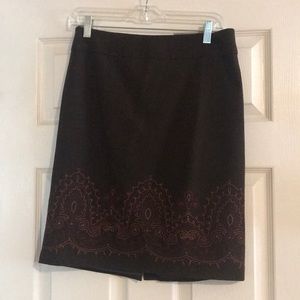 Loft size 2 skirt with back zipper and slit in the back.
